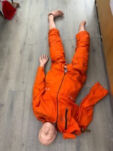 bright orange Mil-Tec flight suit manikin torso